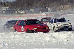 Four cars head out of corner two.