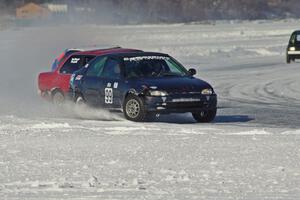 Ryan Hammond / Kyle Laursen Honda Civic and Pete Tavenier / Bruce Powell BMW 318i