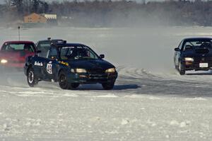 Four cars head into turn one.