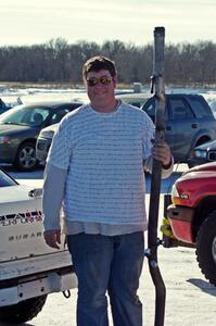 Kevin Beck poses with the exhaust from his Subaru Impreza.