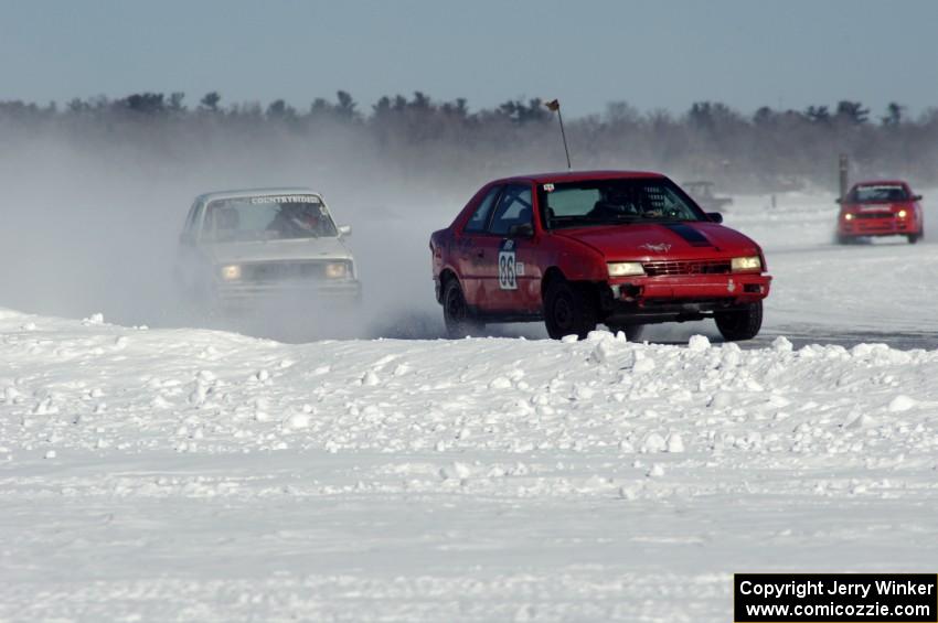 The Chad Reinhofer / Jason Lindell / Cody Reinhofer Plymouth Sundance and Dick Nordby / Josh Vogesver VW Rabbit