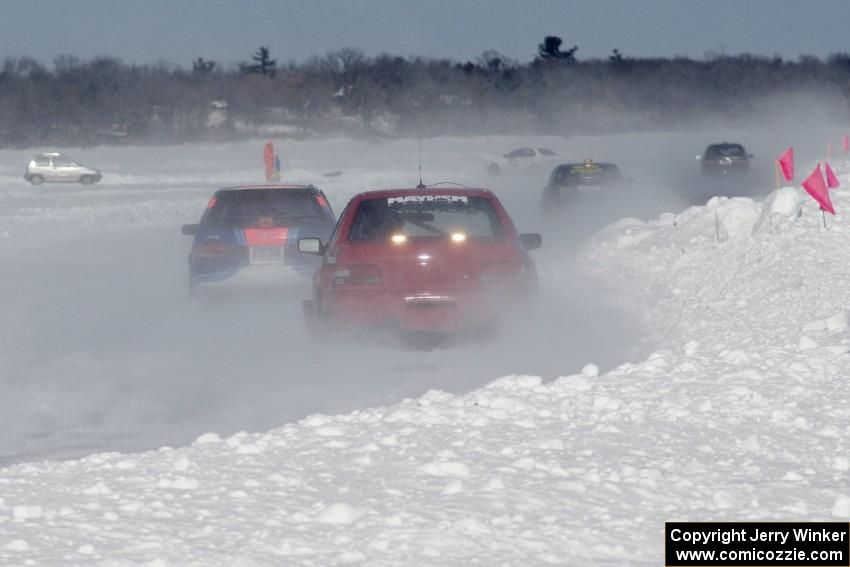 Chris Orr / Terry Orr Mazda 323GTX leads the Mark Utecht / Tom Fuehrer Subaru Impreza