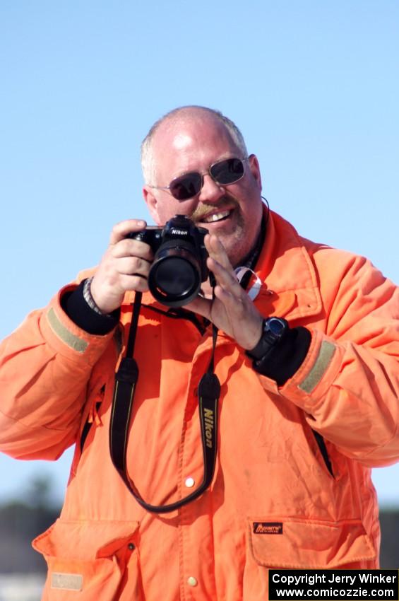 Jim Anderson takes a break from pulling cars out of the bank.