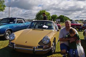 My son Rhys and I in front of a Porsche 912.