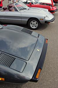 Ferrari 308GTB and two Alfa-Romeo Spiders