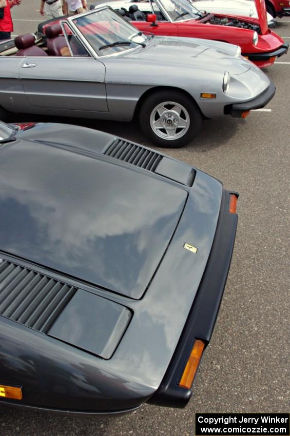 Ferrari 308GTB and two Alfa-Romeo Spiders