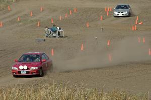 Kerry Freund's SA Subaru Impreza 2.5RS finishes as Jacob Kohler's SA Subaru WRX starts the course