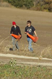 ??? and Martin Asao help stack the cones at the close of the racing day.