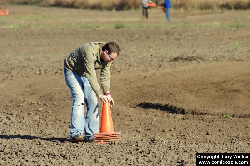 Tim Anderson helps stack the cones at the close of the racing day.