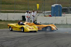 Dave Watson (83) and Matt Gray (64) spin off at turn 13 during the Spec Racer Ford race.