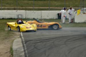 Dave Watson (83) and Matt Gray (64) spin off at turn 13 during the Spec Racer Ford race.