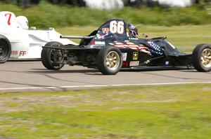 Brad Ellingson's Swift DB-1 Formula Ford passes Alan Murray's similar car