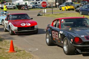 Mark Atkinson's (89) and Jerry Dulski's (93) Datsun 240Zs