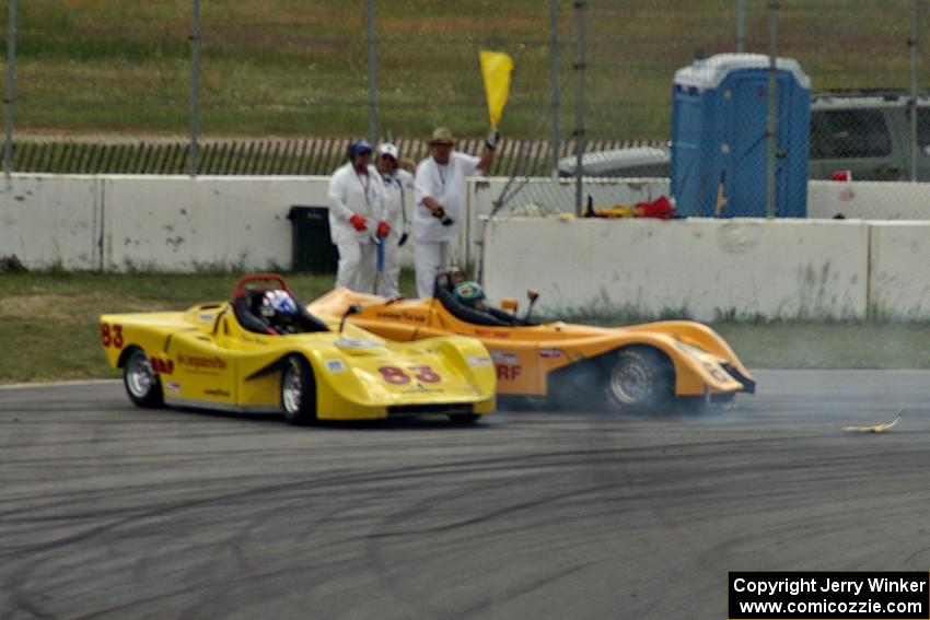 Dave Watson (83) and Matt Gray (64) spin off at turn 13 during the Spec Racer Ford race.