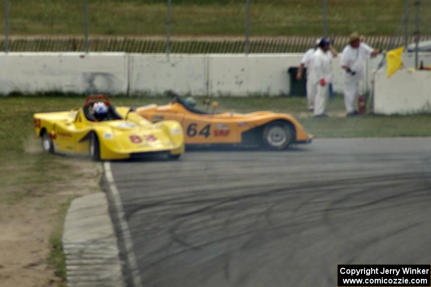 Dave Watson (83) and Matt Gray (64) spin off at turn 13 during the Spec Racer Ford race.