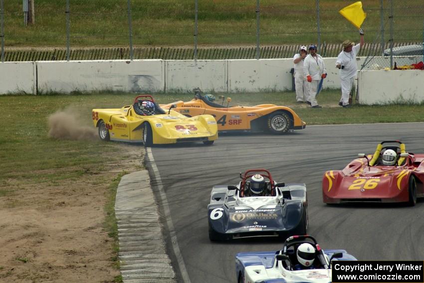 Dave Watson (83) and Matt Gray (64) spin off at turn 13 during the Spec Racer Ford race.