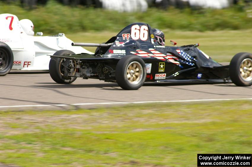 Brad Ellingson's Swift DB-1 Formula Ford passes Alan Murray's similar car