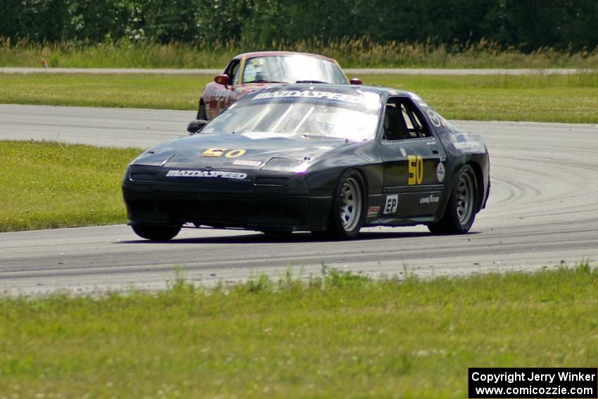 Dave Smith's E Production Mazda RX-7 and Greg Youngdahl's Spec Miata Mazda Miata