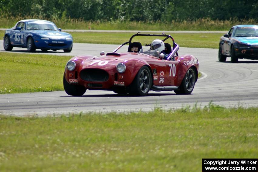 David Gray's SPO Factory Five Cobra, Bruce Andersen, Jr.'s Spec Miata Mazda Miata and Greg Blaser's Spec Miata Mazda Miata