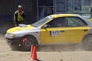 Martin Asao's MA Subaru Impreza leaves the start line after Aaron Jongbloedt sends him off