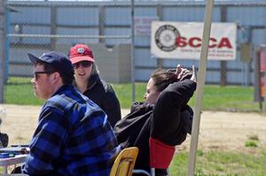 Curran Bishop-Wright, Emily Bevelacque and Anastasia Beaverhausen work timing and scoring.