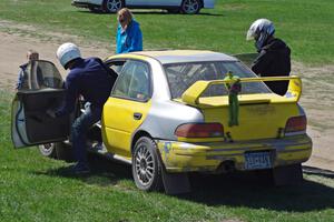 Martin Asao and Tim Anderson swap drivers in their MA Subaru Impreza