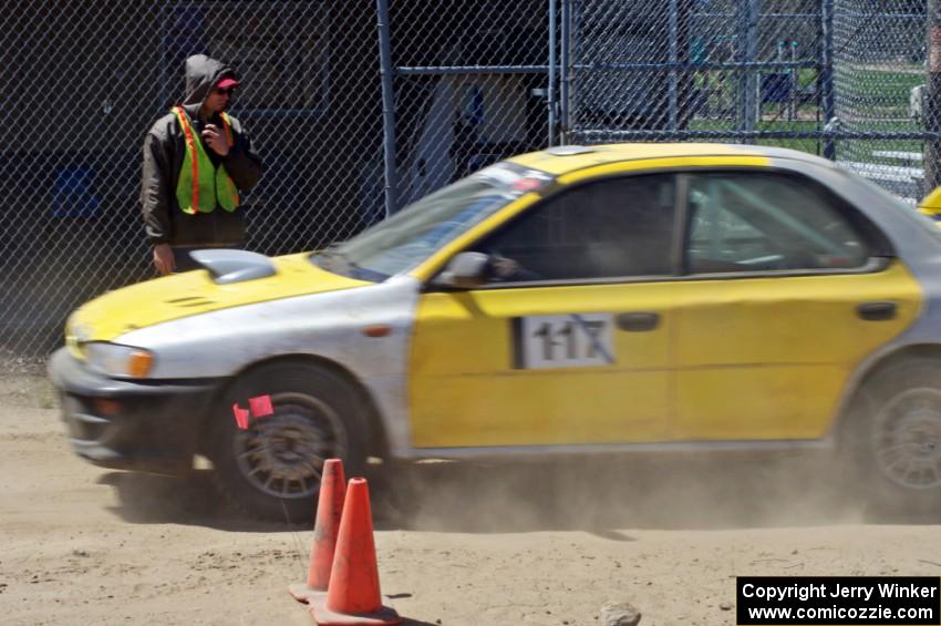 Martin Asao's MA Subaru Impreza leaves the start line after Aaron Jongbloedt sends him off