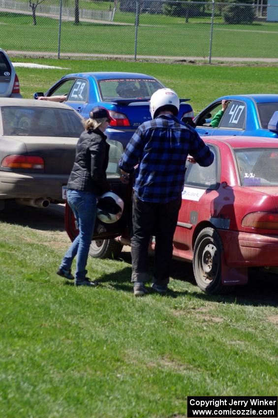 Emily Bevelacque and Curran Bishop-Wright swap drivers in their PA Subaru Impreza