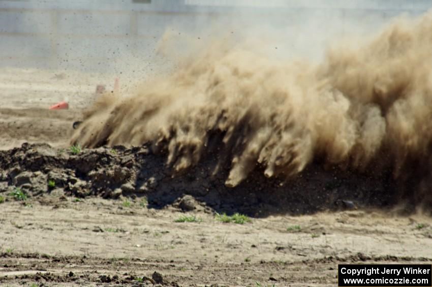 Martin Asao's MA Subaru Impreza throws a cloud of dust