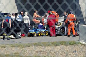 Steve Hendricks is freed from his wrecked SSC VW Rabbit