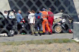 Steve Hendricks is freed from his wrecked SSC VW Rabbit