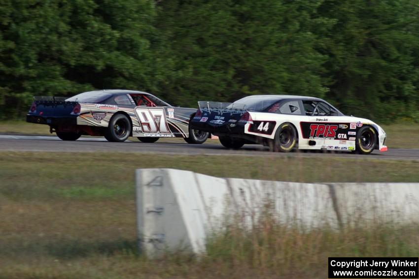 John Cottrell's GTA Chevy Monte Carlo nips ahead of Brian Goodwin's GTA Chevy Monte Carlo