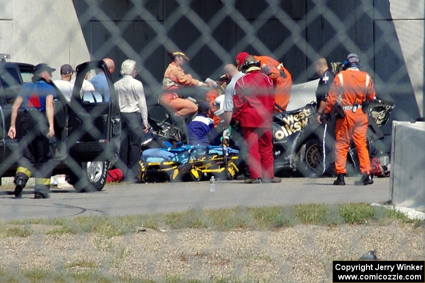 Steve Hendricks is freed from his wrecked SSC VW Rabbit