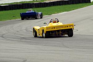 Jed Copham chases Reid Johnson, both in Spec Racer Fords