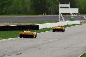 Matt Gray chases Tim Gray down the front straight, both in Spec Racer Fords