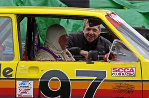 Jimmy Griggs gets ready in his GT-Lite VW Rabbit with help from Paul Moorman