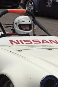 Bill Wessel sits in his F Production Datsun SPL311