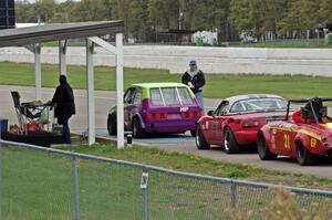 At the scales: Brooke Fairbanks's H Production VW Rabbit, Lon Blaser's Spec Miata Mazda Miata and Don Haaversen's E Production