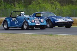 Pat Starr's Morgan +4 and Darwin Bosell's Chevy Corvette go side-by-side into turn 3
