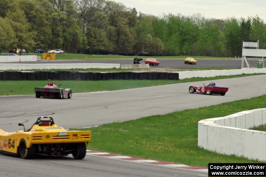 Jim Gray's Spec Racer Ford spins as the similar cars of Robyn Goolsbey and Matt Gray prepare to get by cleanly