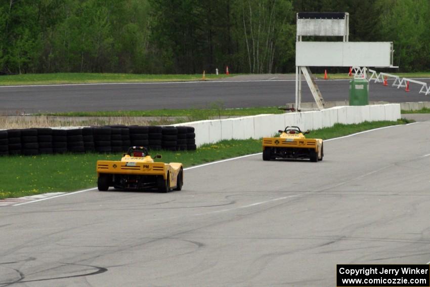 Matt Gray chases Tim Gray down the front straight, both in Spec Racer Fords