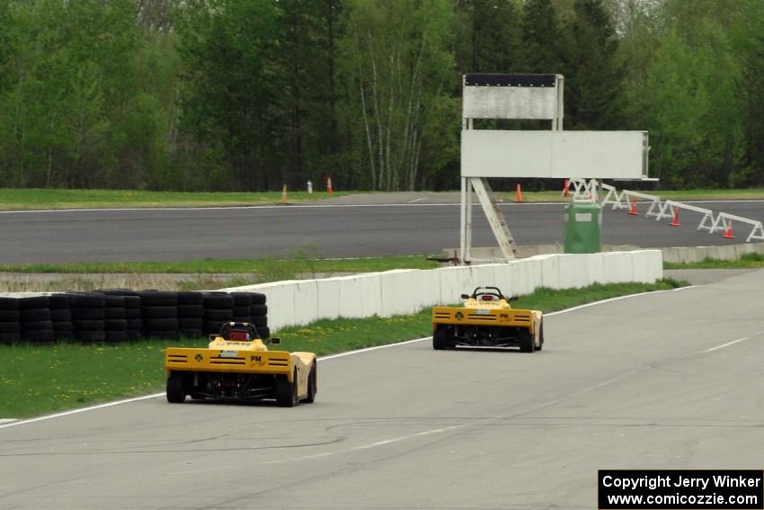 Matt Gray chases Tim Gray down the front straight, both in Spec Racer Fords