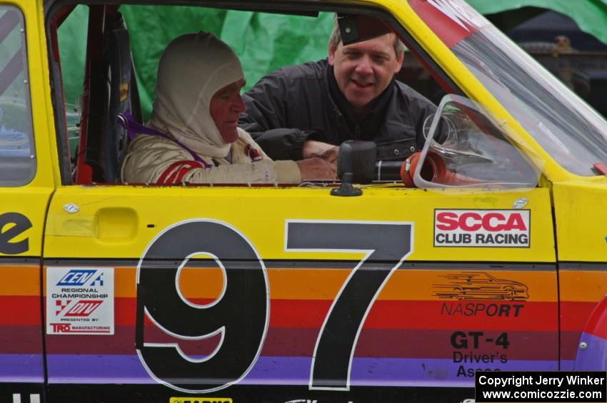 Jimmy Griggs gets ready in his GT-Lite VW Rabbit with help from Paul Moorman