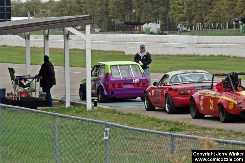 At the scales: Brooke Fairbanks's H Production VW Rabbit, Lon Blaser's Spec Miata Mazda Miata and Don Haaversen's E Production