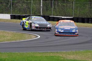 Derek Thorn's Ford Fusion and Dallas Montes's Chevy Impala