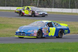 John Wood's Toyota Camry and Taylor Cuzick's Ford Fusion