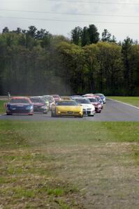 The field behind the pace car on the pace lap.