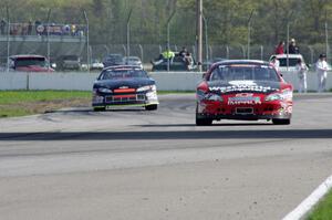 Carl Harr's Chevy Impala ahead of Dylan Hutchison's Chevy Impala