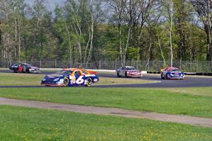 Derek Thorn's Ford Fusion leads Dylan Lupton's Ford Fusion, Cameron Hayley's Ford Fusion and Michael Self's Chevy Impala