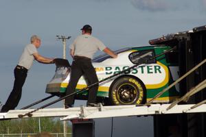 Andrew Ranger's Dodge Charger goes back into the transporter.